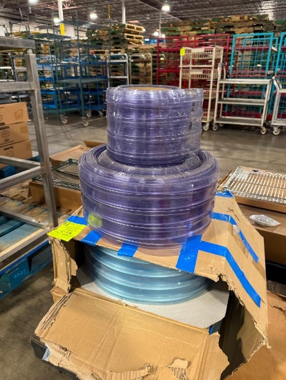 Pallet of rolled up plastic flaps