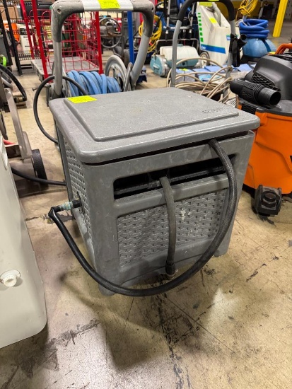 Suncast hose and reel in plastic box container