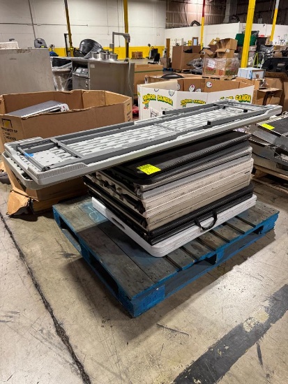 Pallet of plastic foldibale tables