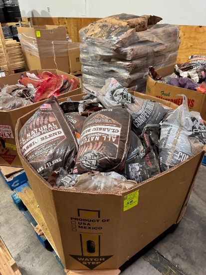 Pallet of smoking pellets and wood