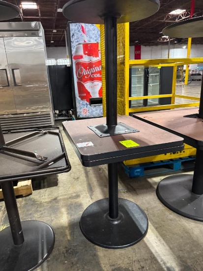 Tables with metal base and wood like top
