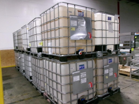 Large plastic liquid containers with dispenser valve in metal frame
