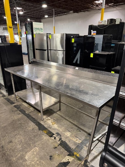 Win-holt stainless steel table w/ backsplash and half undershelf