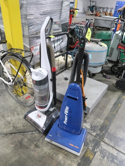 Upright vacuum cleaners
