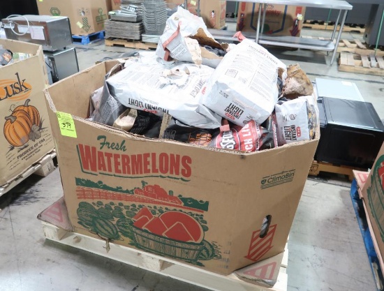Bin of charcoal and charcoal briquets