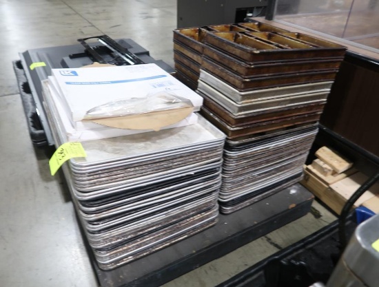 Pallet of aluminum sheet pans and bread pans
