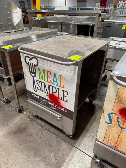 Stainless steel table with adjustable bottom shelf on casters