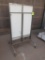2-sided merchandising shelving unit, no shelves, on casters
