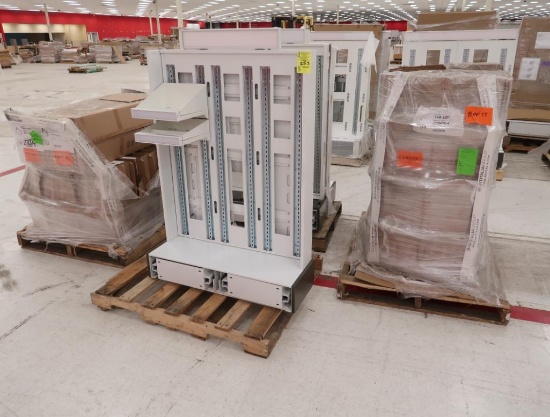 endcap shelving units w/ pallet of front-lit shelves & short & tall shelf trays