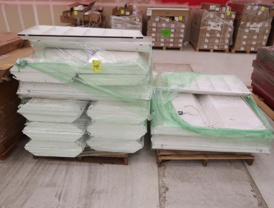 pallets of LED 2x4 troffer lighting fixtures