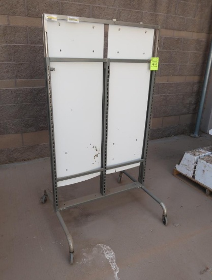 2-sided merchandising shelving unit, no shelves, on casters