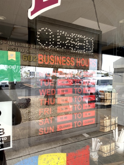 HOURS OF OPERATION SIGN