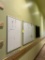 WHITEBOARDS AND BULLETIN BOARD IN HALLWAY