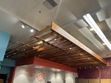 DECORATIVE WOODEN AWNING OVER OLIVE BAR/CHEESE