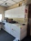 MILLWORK SINK TABLE AND CABINETRY IN PHARMACY
