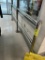 ALL CART CONTAINMENT RAILING AT FRONT OF STORE