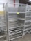 aluminum tub/tray rack, on casters w/ 3) sides covered