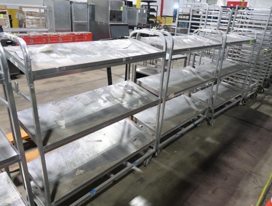 solid shelving stocking carts on casters (3) angled shelves