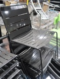 pallet of stackable metal chairs