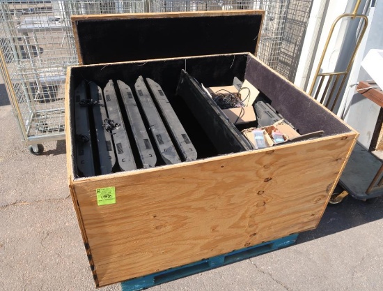 crate of flat panel TVs, look new