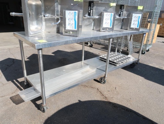 stainless table w/ undershelf & can opener, on casters