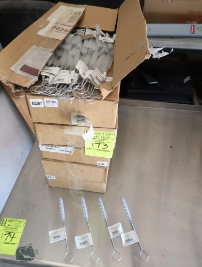 6) boxes of round plastic brushes on handles