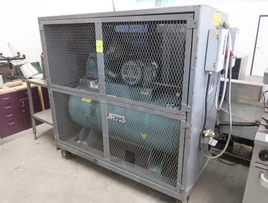 Curtis 15hp air compressor in cage, on casters