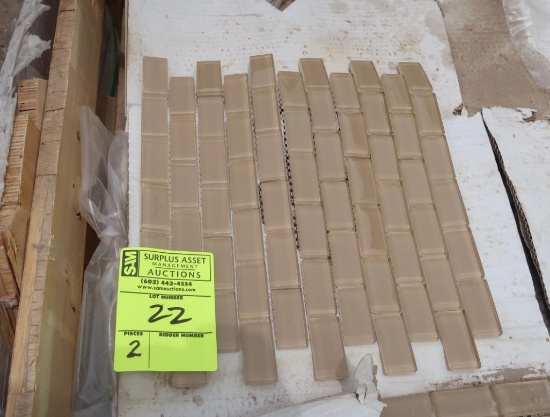pallets of glass mosaic tile, tanish color