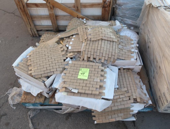 pallet of glass mosaic tile, tanish color