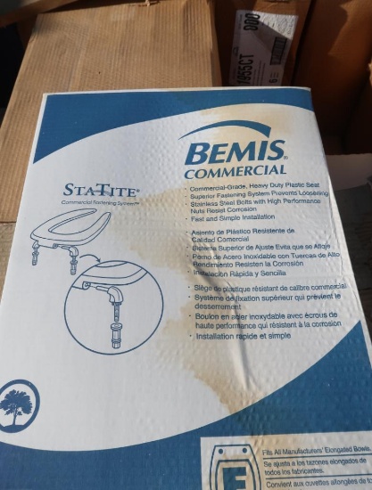 pallet of Bemis elongated plastic toilet seats, open front
