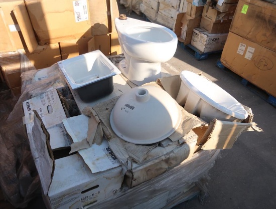 pallet of Kohler toilet bowls, sinks, & floor sinks