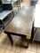 WOOD TABLE ON CASTERS