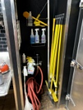 GROUP OF CLEANING SUPPLIES AND RED HOSE