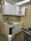 MILLWORK SINK TABLE AND CABINETRY IN PHARMACY