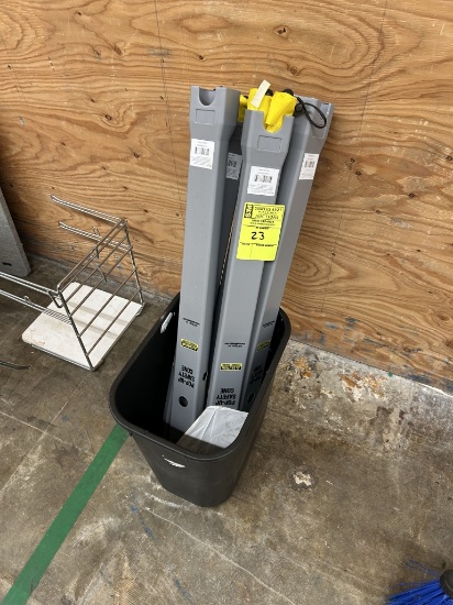 BIN OF WET FLOOR CONES AND HOUSING