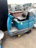 TENNANT RIDE ON FLOOR SCRUBBER