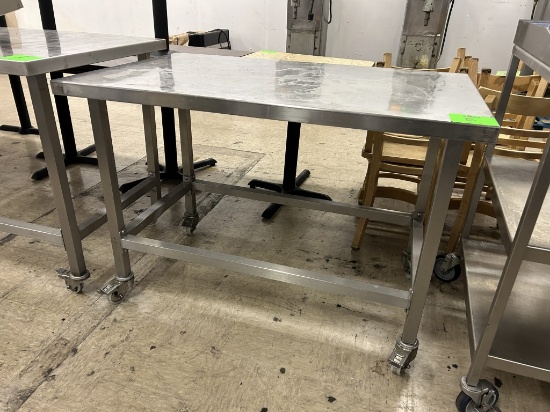48IN X 30IN X 34IN STAINLESS STEEL TABLE ON CASTERS