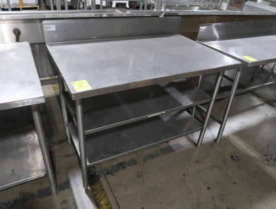 stainless table w/ backsplash & 2) undershelves