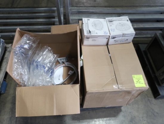 pallet of LED recessed lighting parts