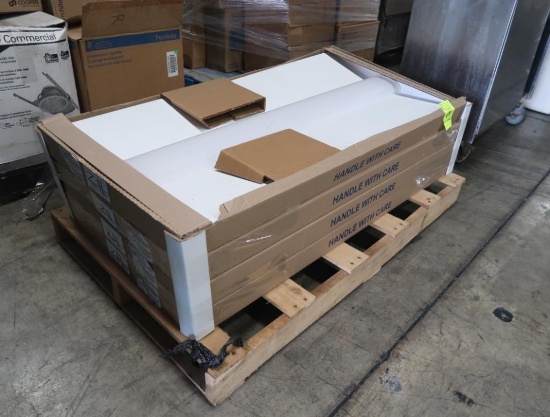 pallet of LED troffer light fixtures