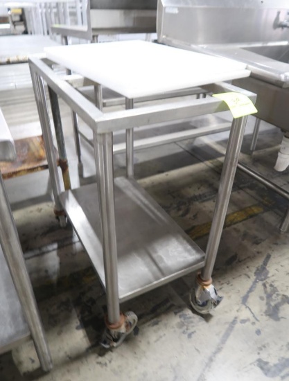 stainless table frame w/ undershelf, on casters, & 2) poly boards