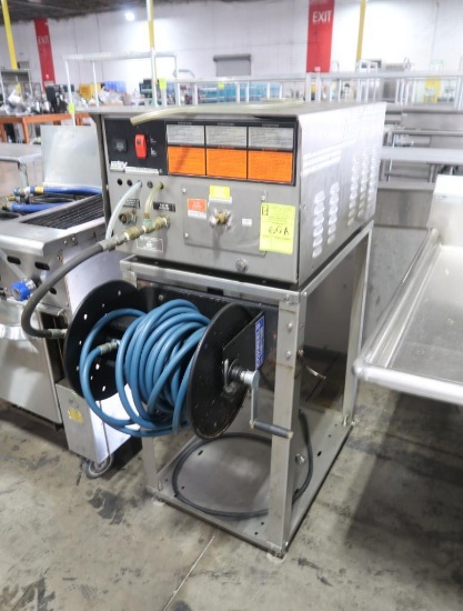Hotsy pressure washer, on stand