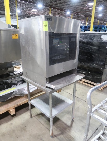 Aerospec stainless dust free computer enclosure on stainless table