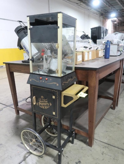 Old Fashioned movie time popcorn maker on cart