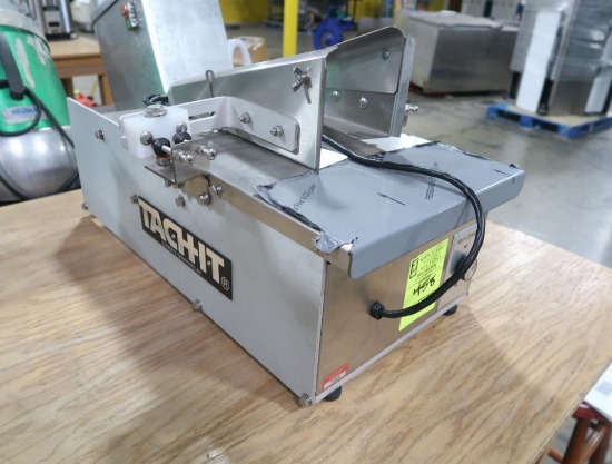 Tach-It automatic bag opener