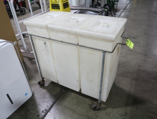 dry ingredient bins in metal frame w/ casters