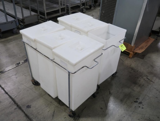dry ingredient bins in metal frame w/ casters