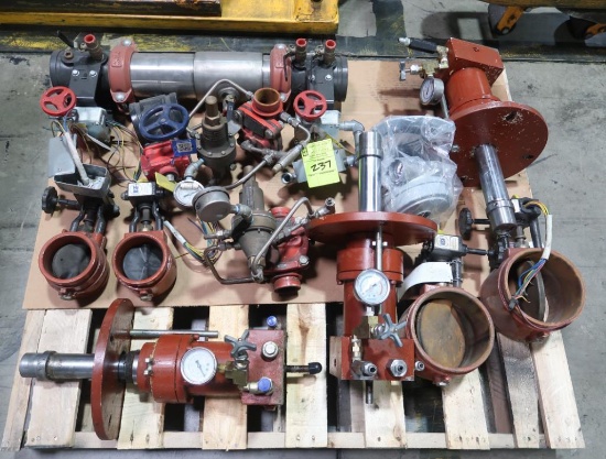 pallet of hydraulic cylinders and valves