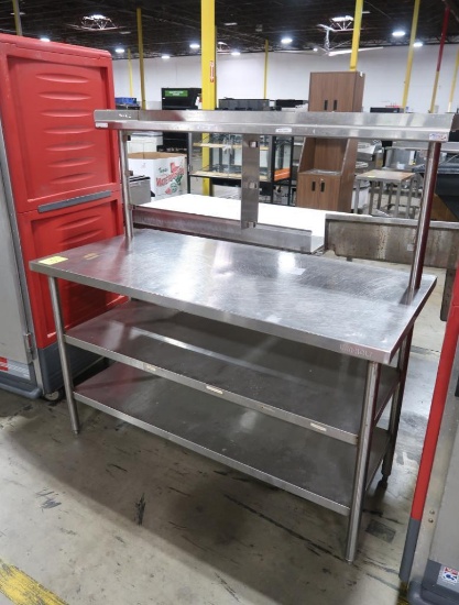 stainless table w/ two botton shelves, one top shelf