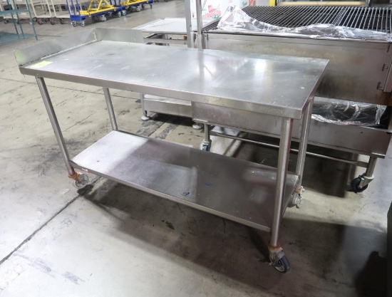 stainless table w/ partial backsplash, bottom shelf,